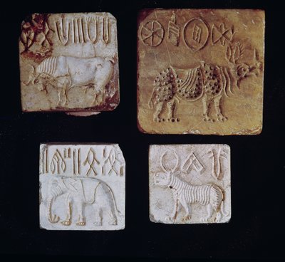Four seals depicting a bull, a rhinoceros, an elephant and a tiger with pictographic symbols, from the Indus Valley, Pakistan, 3000-1500 BC Four seals depicting a bull, a rhinoceros, an elephant and a tiger with pictographic symbols, from the Indus Valley, Pakistan, 3000-1500 BC