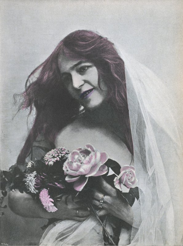 Portrait of a woman holding a bouquet of flowers by (after) French Photographer