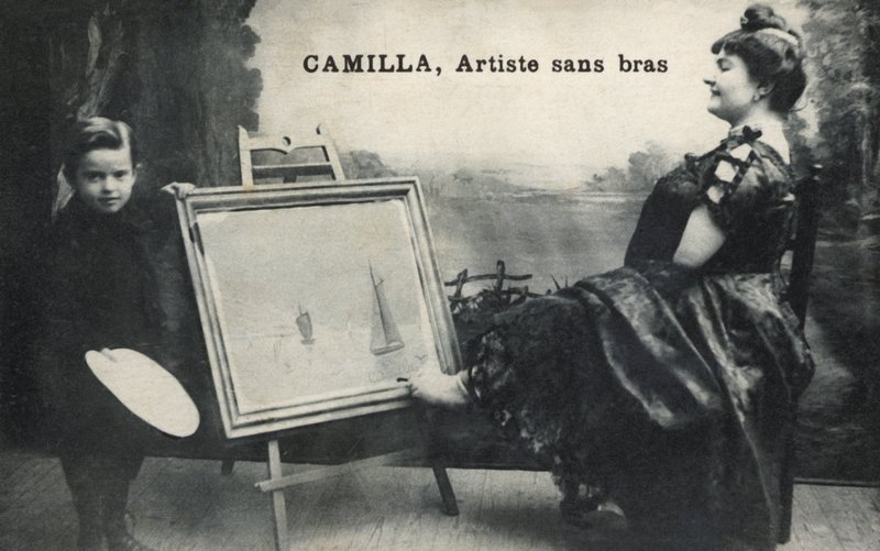 Woman painting with her feet by French Photographer