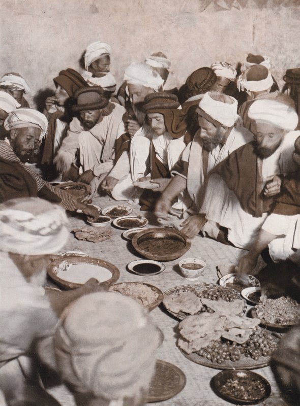Arab Villagers Eating a Meal, Palestine by American Photographer