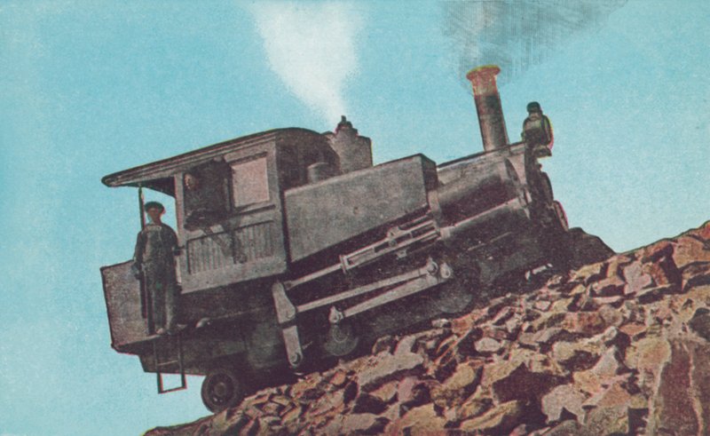 Cog Road Engine Climbing Pikes Peak, Colorado by American Photographer