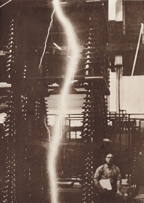 Discharge of artificial lightning from a five million-volt generator by American Photographer