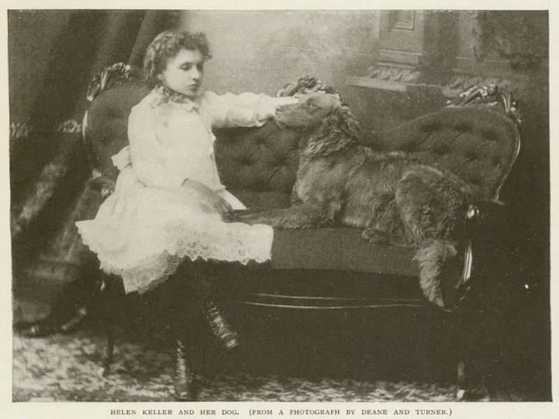 Helen Keller and her dog by American Photographer
