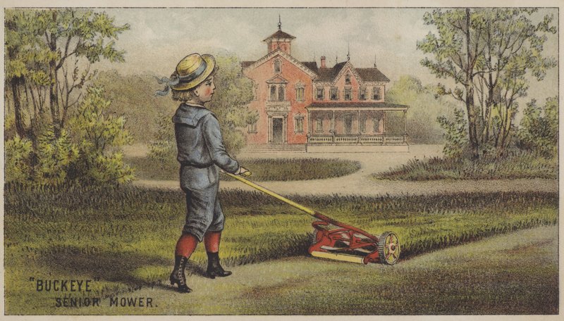 Boy mowing grass outside country house by American School