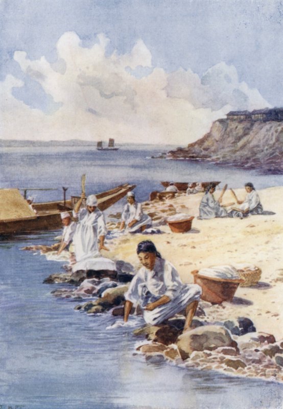 Korean women washing clothes in a river by E.H. Fitchew