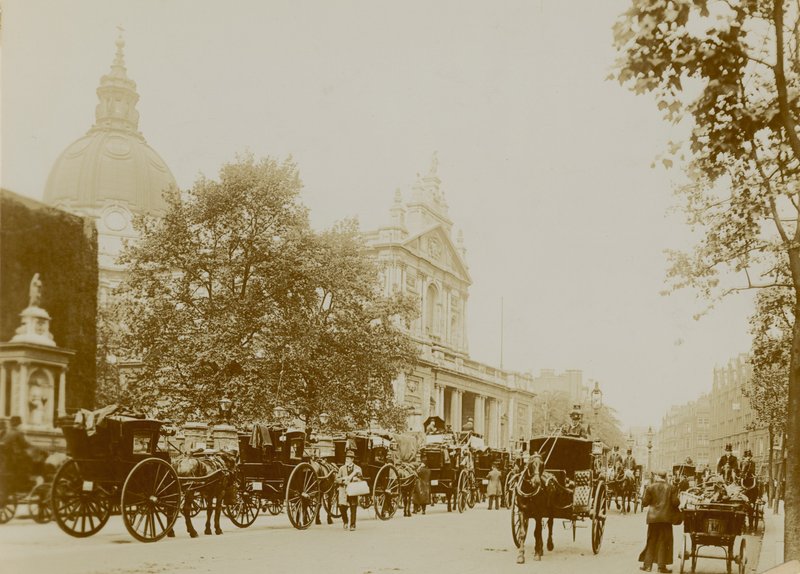 A Busy Street Scene with Brompton Oratory by English Photographer