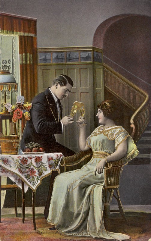 A couple toasting each other