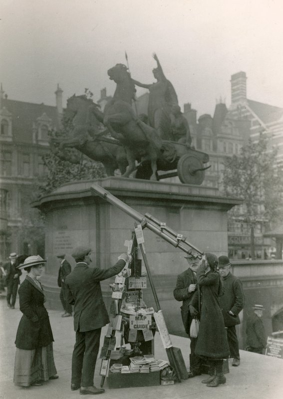 A Man Selling Views Through a Telescope by English Photographer