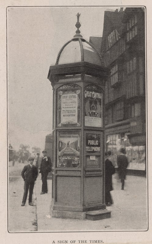 A public telephone by English Photographer