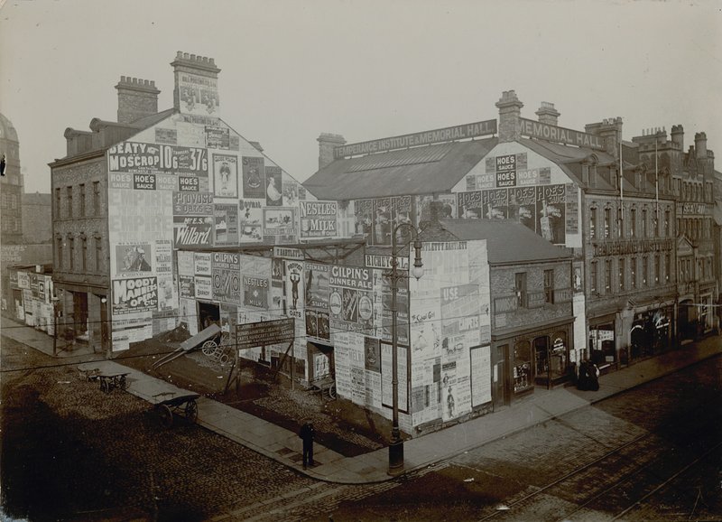Advertising on houses, London by English Photographer