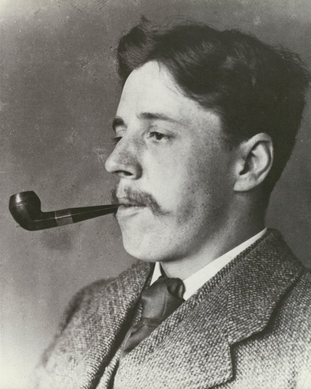 Arnold Bennett, smoking a pipe, portrait by English Photographer