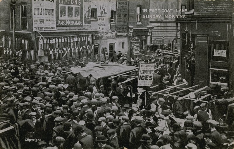 In Petticoat Lane, London, on Sunday morning by English Photographer