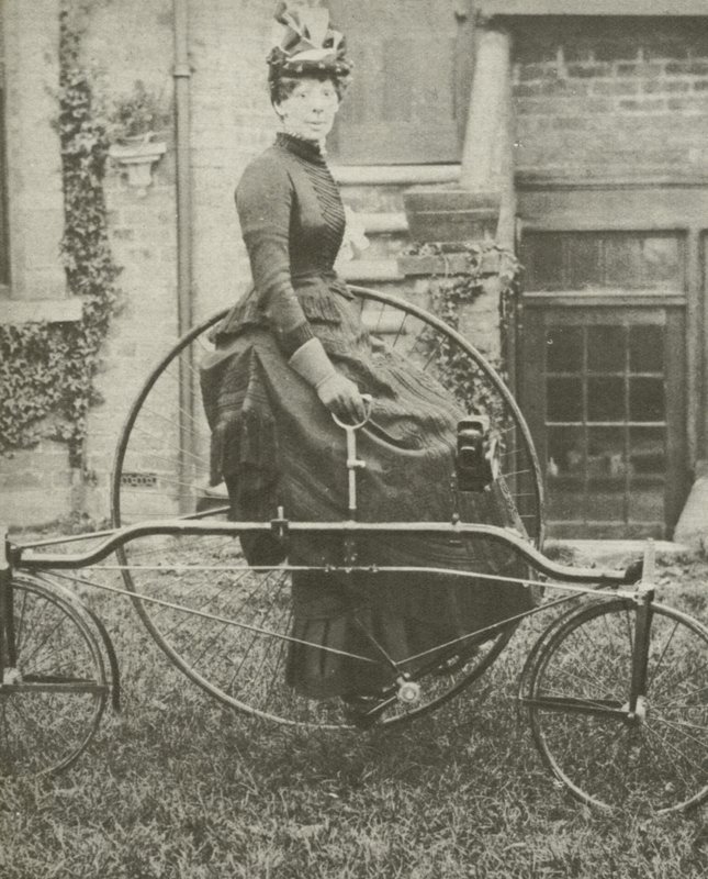 Lady on tricycle by English Photographer