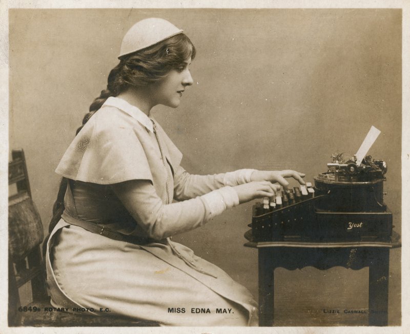 Miss Edna May, at typewriter by English Photographer