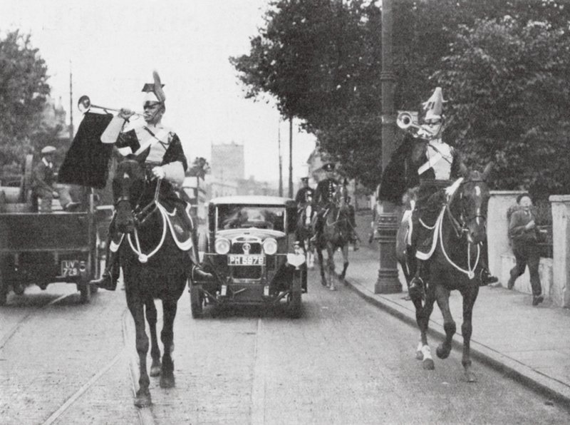 Mounted Heralds of Arms Preceding an Official Car, London by English Photographer