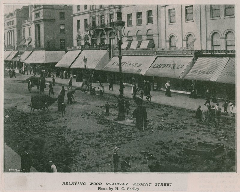 Relaying wood roadway Regent Street by English Photographer