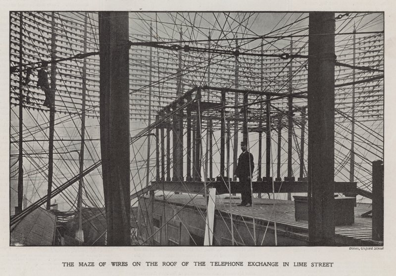 The maze of wires on the roof of the Telephone Exchange in Lime Street by English Photographer