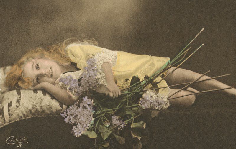 Young Girl and Flowers by English Photographer