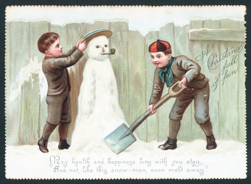 Boys building Snowman by English School