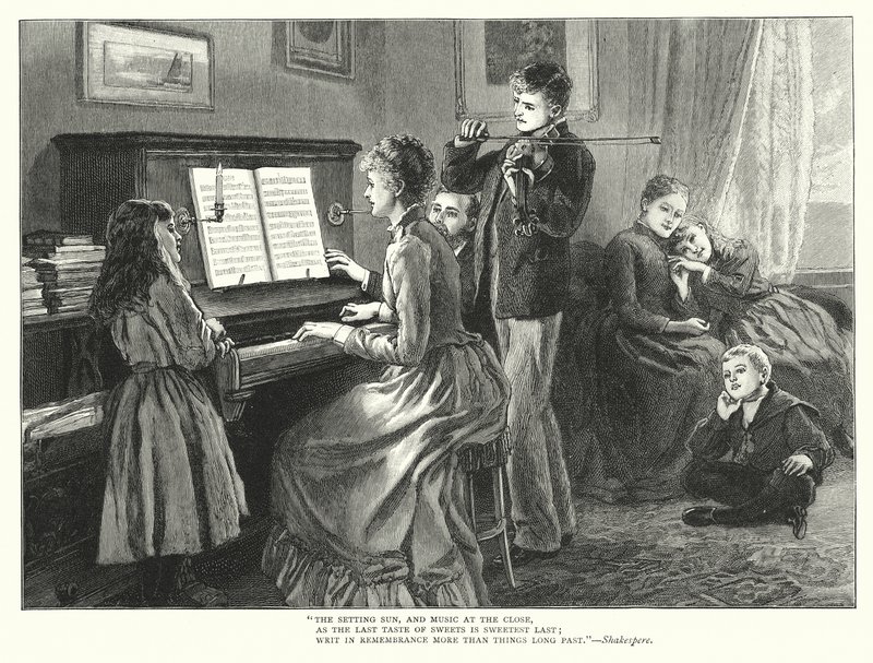 Family playing music together by English School