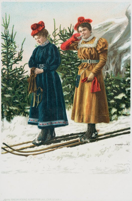 Two women on skis as they ski down a snowy landscape by English School