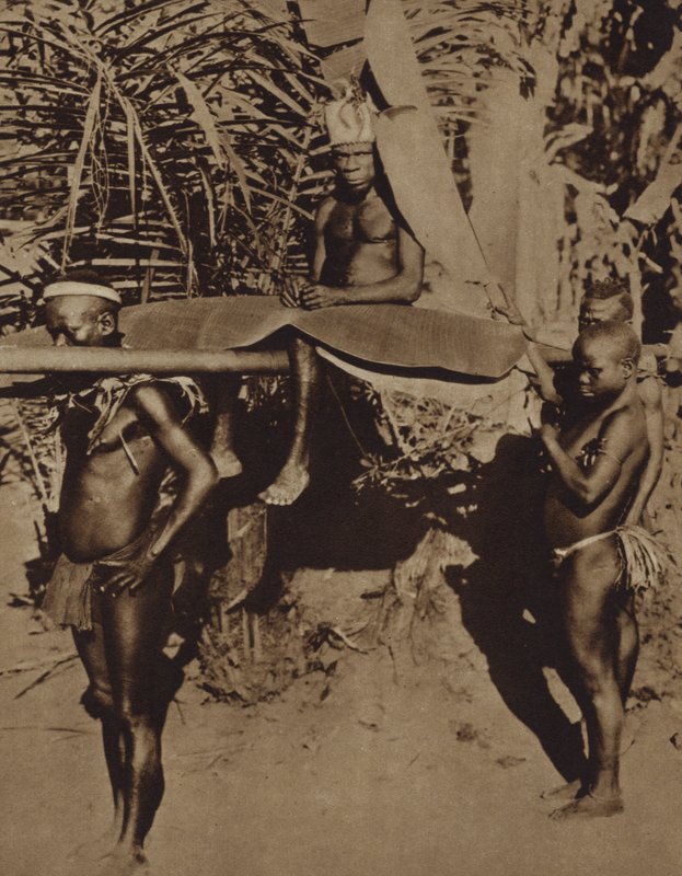 Chief of an African Pygmy Tribe Being Carried on a Litter (b/w photo) by European Photographer