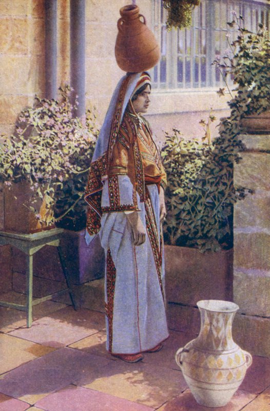 Young woman carrying water on her head, in Bethlehem, Palestine by European Photographer