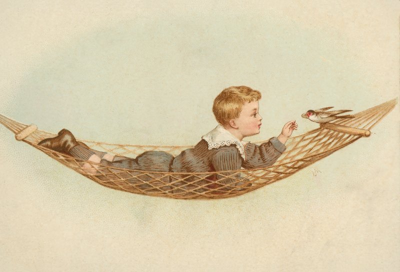 Boy lying in a hammock feeding a bird by European School