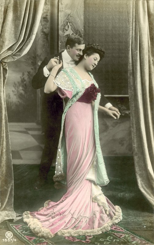 Man making advances on fashionable lady by French Photographer