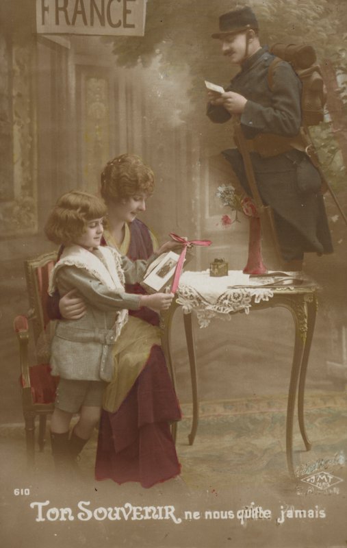 A mother and child prepare a letter for their soldier father by French Photographer