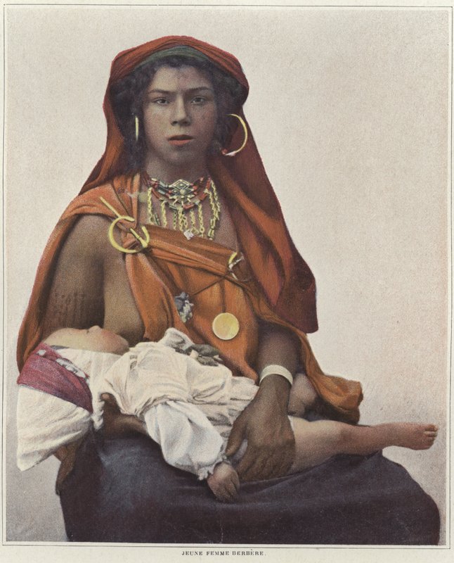 A Young Berber Woman Breastfeeding Her Baby by French Photographer