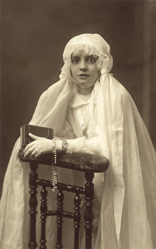 Beautiful young girl, dressed for her First Communion by French Photographer