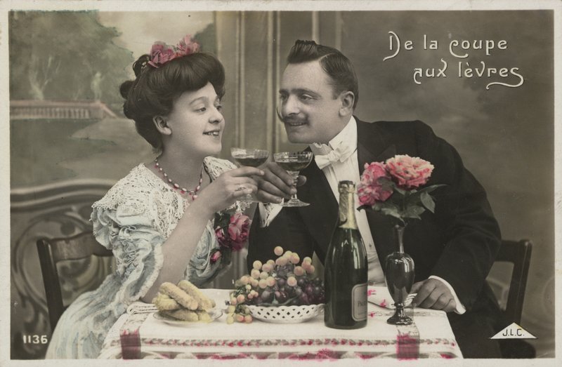 Couple drinking champagne by French Photographer