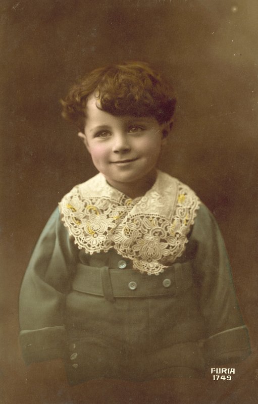 Cute boy, with a big smile by French Photographer