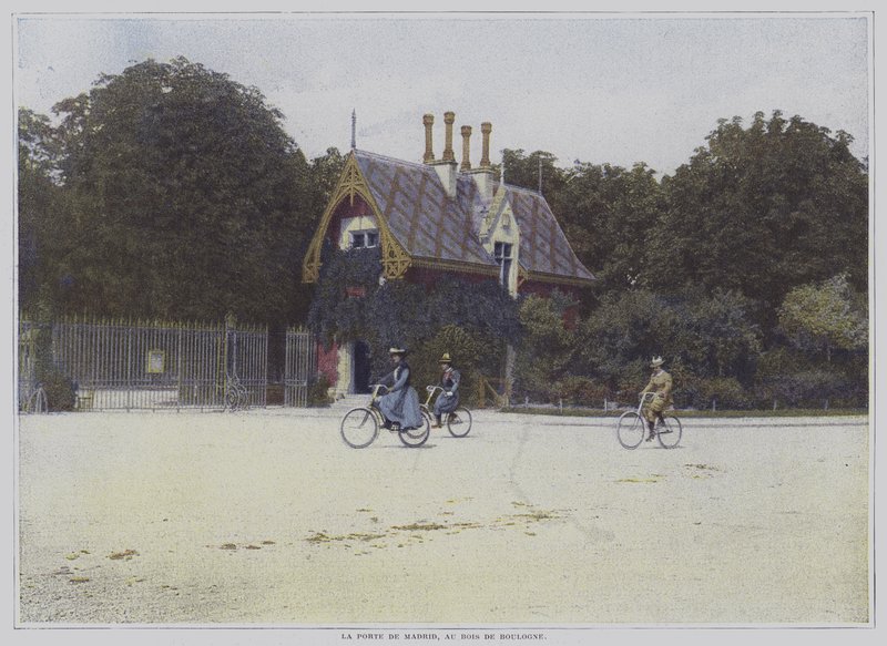 Cyclists riding past the Porte de Madrid in the Bois de Boulogne, Paris by French Photographer