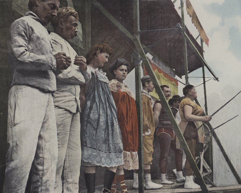 Fairground entertainers on stage by French Photographer