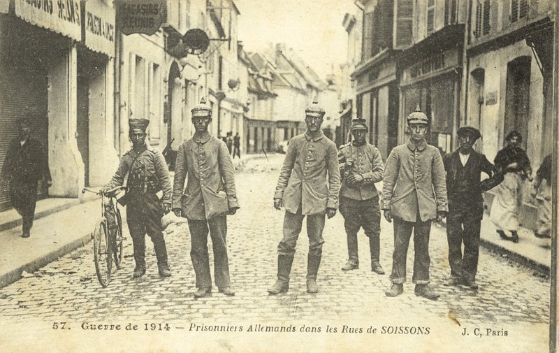 German prisoners on the streets of Soissons, France, World War I by French Photographer