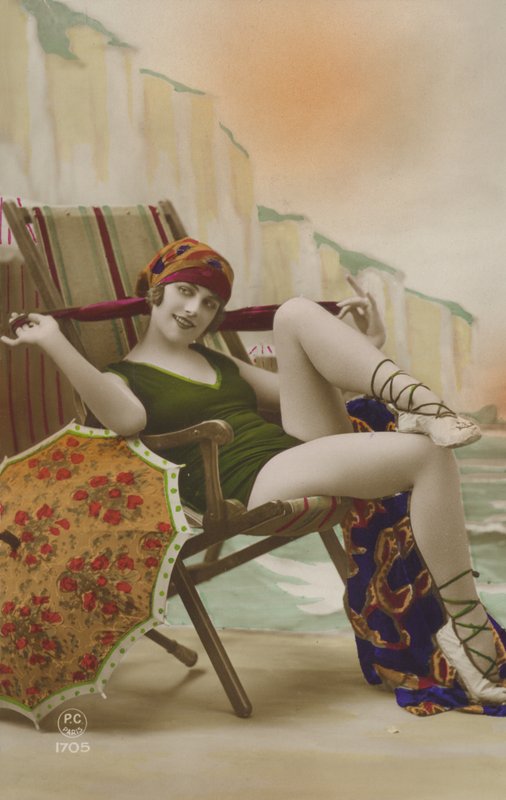 Girl in a deck chair by French Photographer