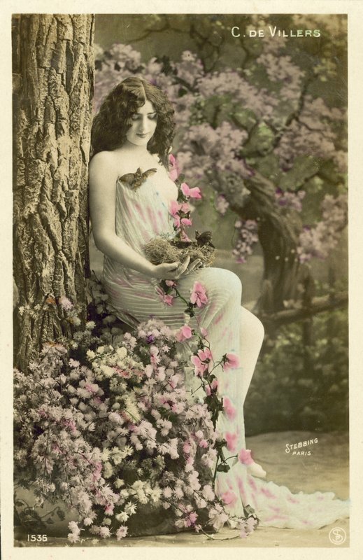 Girl with flowers by French Photographer
