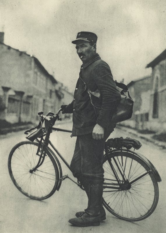 This French postman finds his bicycle very useful by French Photographer