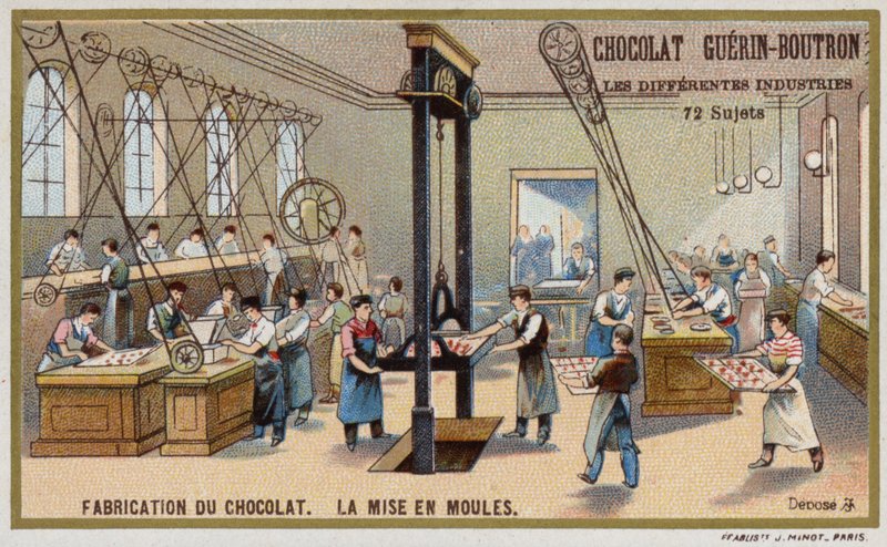 Chocolate manufacturing. Putting chocolate into moulds by French School