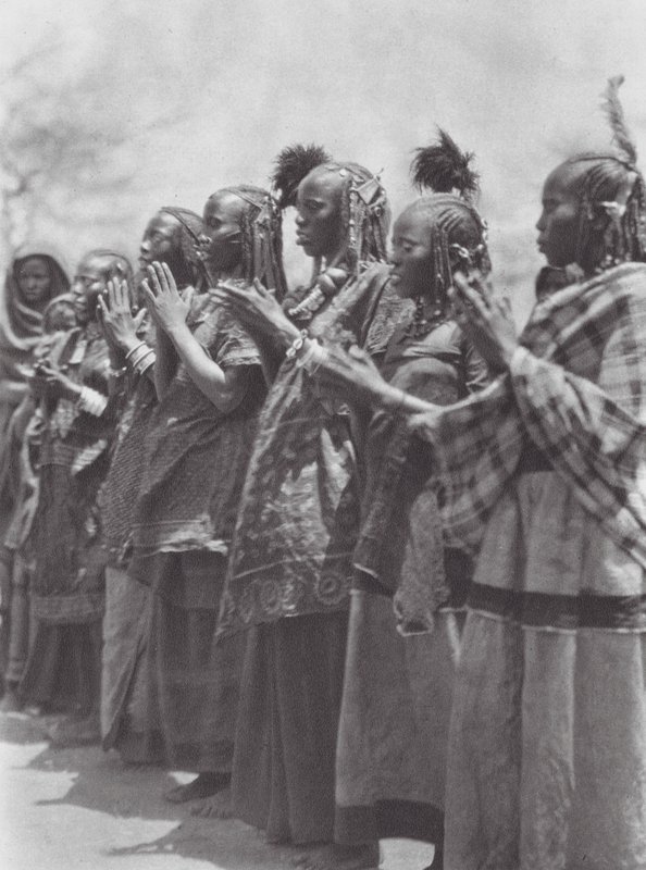 Africa: Aulad Hamid women clapping time at a dance by Hugo Adolf Bernatzik