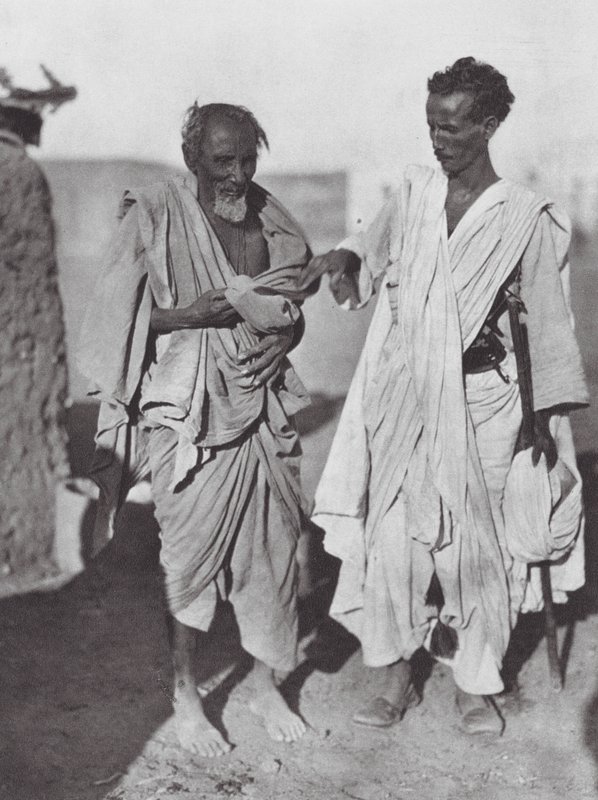 Africa: Bisharin men, Nubian desert by Hugo Adolf Bernatzik