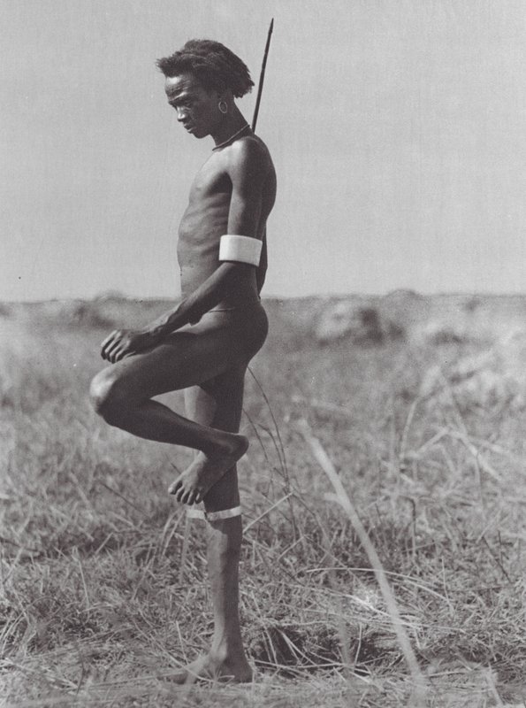 Africa: Nuer, resting position by Hugo Adolf Bernatzik