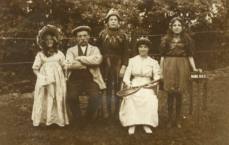 Family wearing fancy dress by Irish Photographer