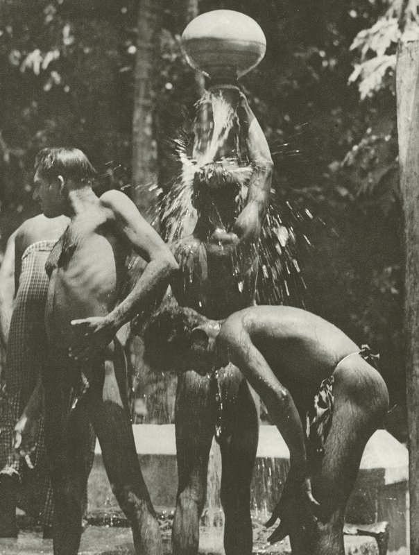 At the well by Lionel Wendt