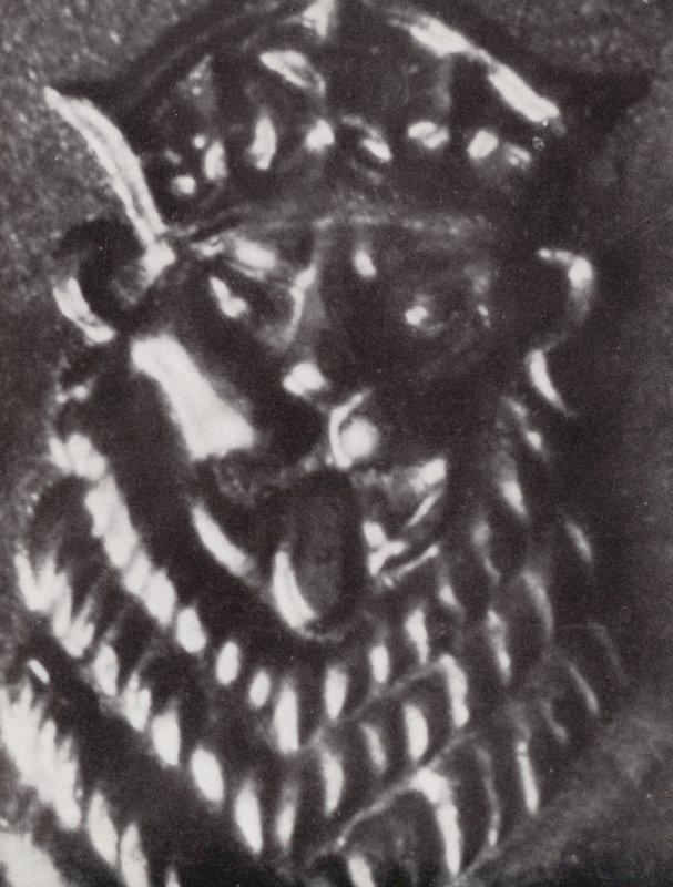 Head of a lion on a One Shilling coin by Paul Henning