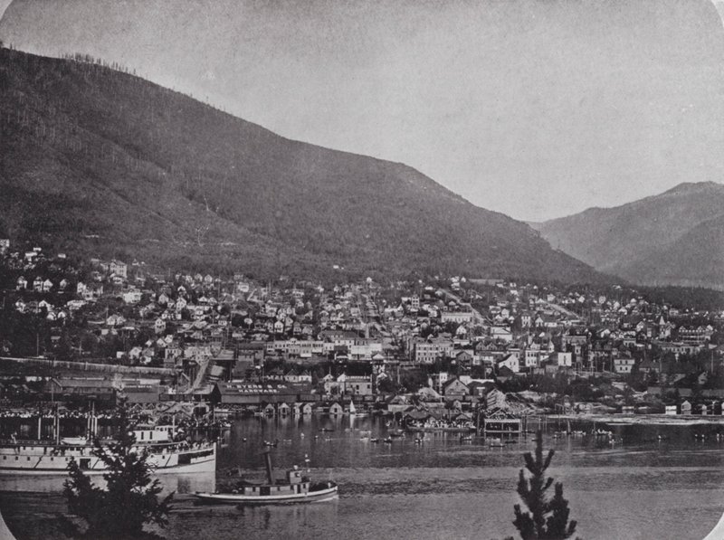 Nelson, from across the Kootenay River by Photographer Canadian