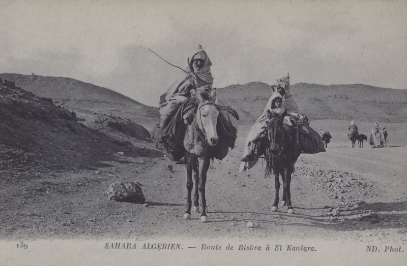 Travellers in the Algerian Sahara on the road from Biskra to El Kantara by Photographer French