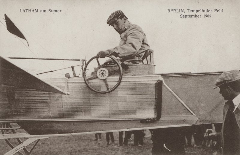 French Aviator Hubert Latham at the Controls of His Aeroplane, Tempelhof Airfield, Berlin, September 1909 by Photographer German